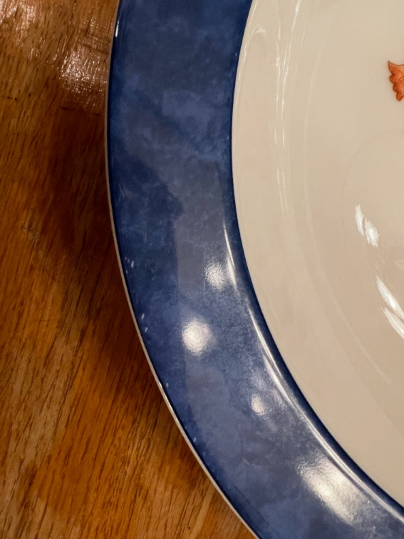 Un plat rond creux Bernardaud modèle Borghese
