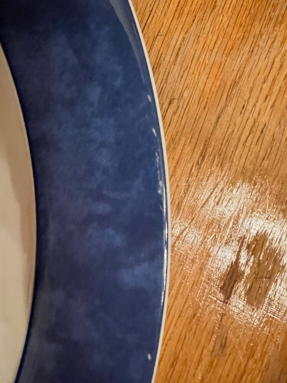 Un plat rond creux Bernardaud modèle Borghese