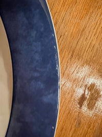 Un plat rond creux Bernardaud modèle Borghese